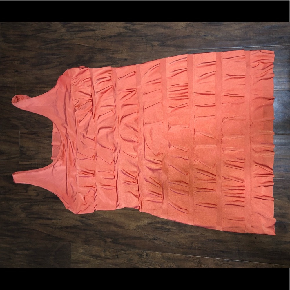 Coral ruffle dress.